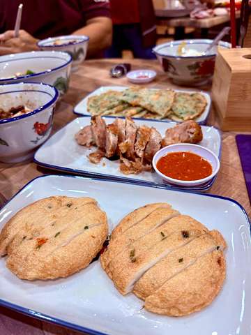 Assorted fried dishes and sliced meat with red sauce at Uncle Soon Plus Kitchen House