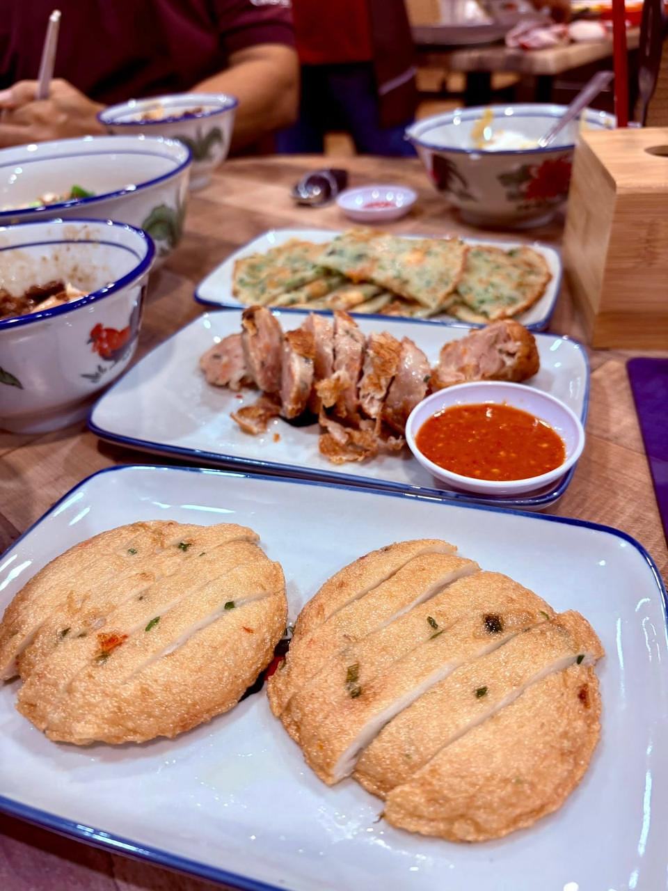 Assorted fried dishes and sliced meat with red sauce at Uncle Soon Plus Kitchen House