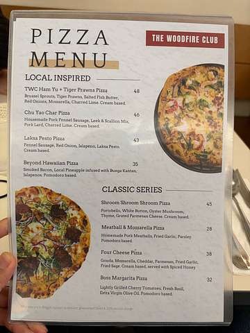 Wood-fired pizza or dish at The WoodFire Club SS15