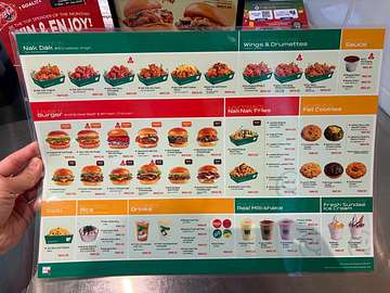 NakNak Sunway Pyramid menu board showing Korean fried chicken, burgers, fries, drinks and desserts