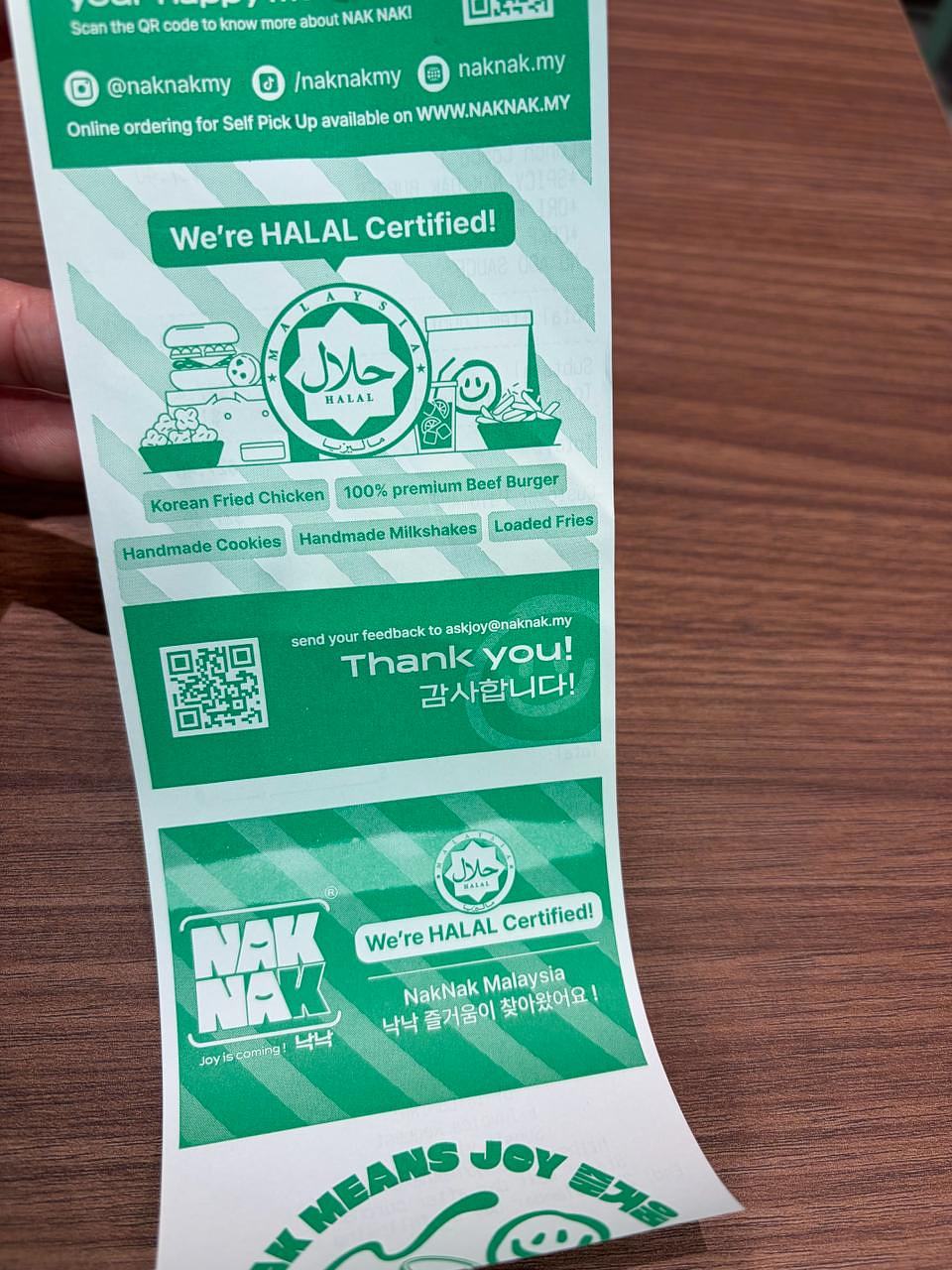 NakNak receipt showing halal certification and menu categories