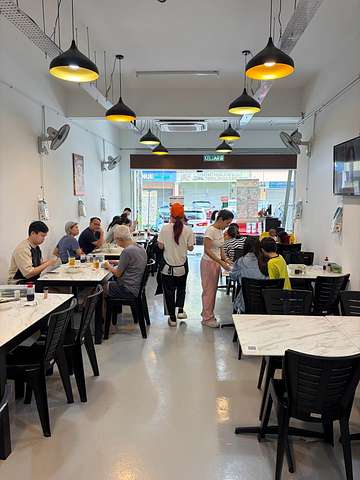 Goldenzuu Kitchen Pork Noodle interior with diners in USJ 1