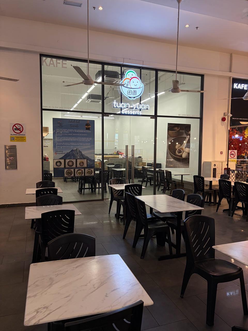 Tuan Yuan Desserts cafe interior with seating