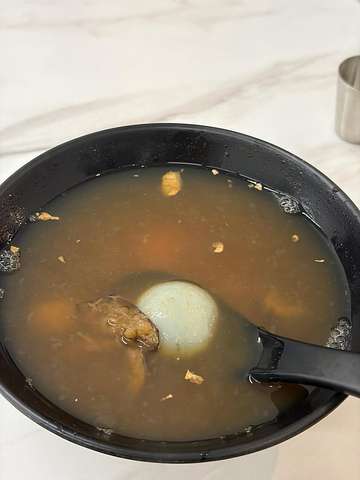 Tuan Yuan Desserts bowl of soup with poached egg and meat