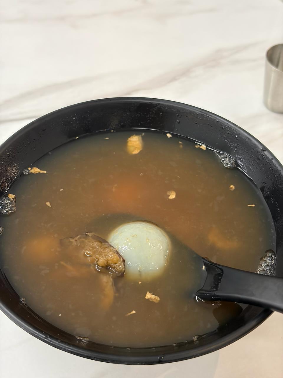 Tuan Yuan Desserts bowl of soup with poached egg and meat