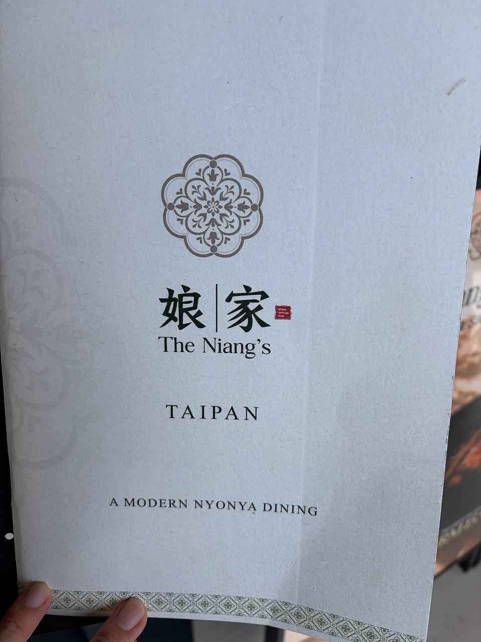 The Niang's Taipan main signage - Modern Nyonya Dining