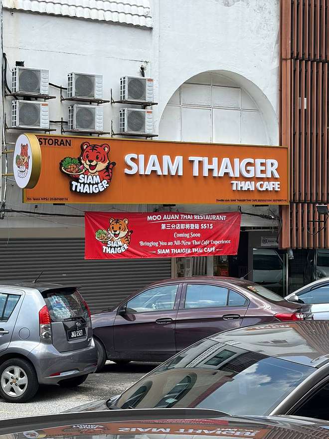Siam Thaiger Thai Cafe SS15 storefront exterior with orange tiger signage and coming soon banner